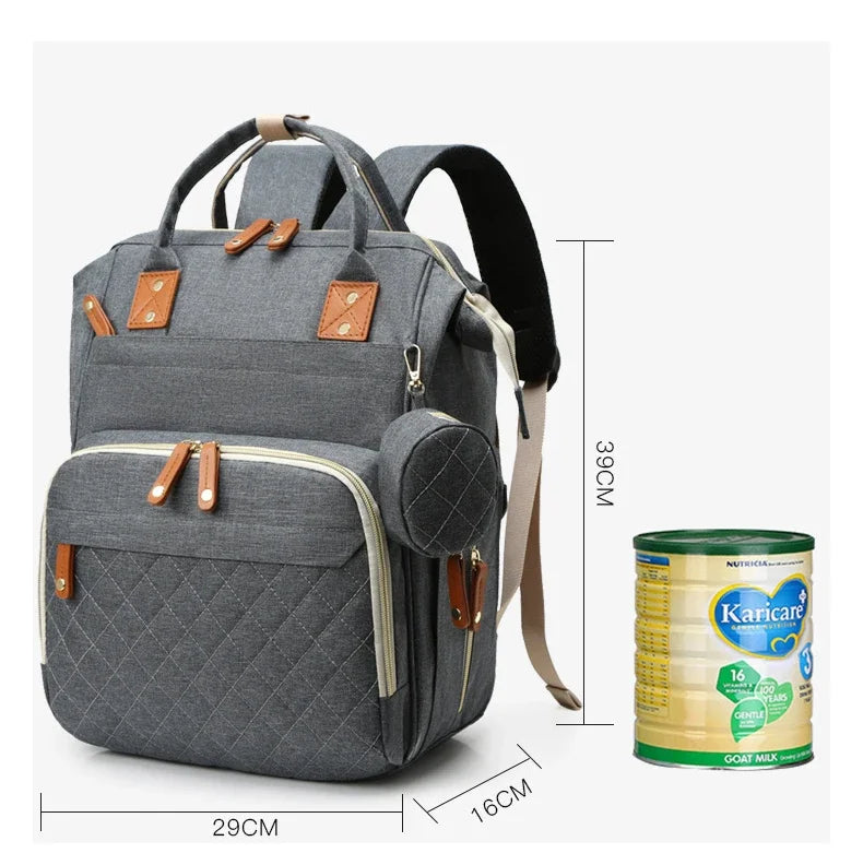 Sac à Dos à Langer pour bébé, Sac de Voyage avec Lit de Bébé Portable, 35L Grande Capacité Sac de Maternité, Sac à Couches Multifonction avec 2 Sangles de Poussette et Berceau