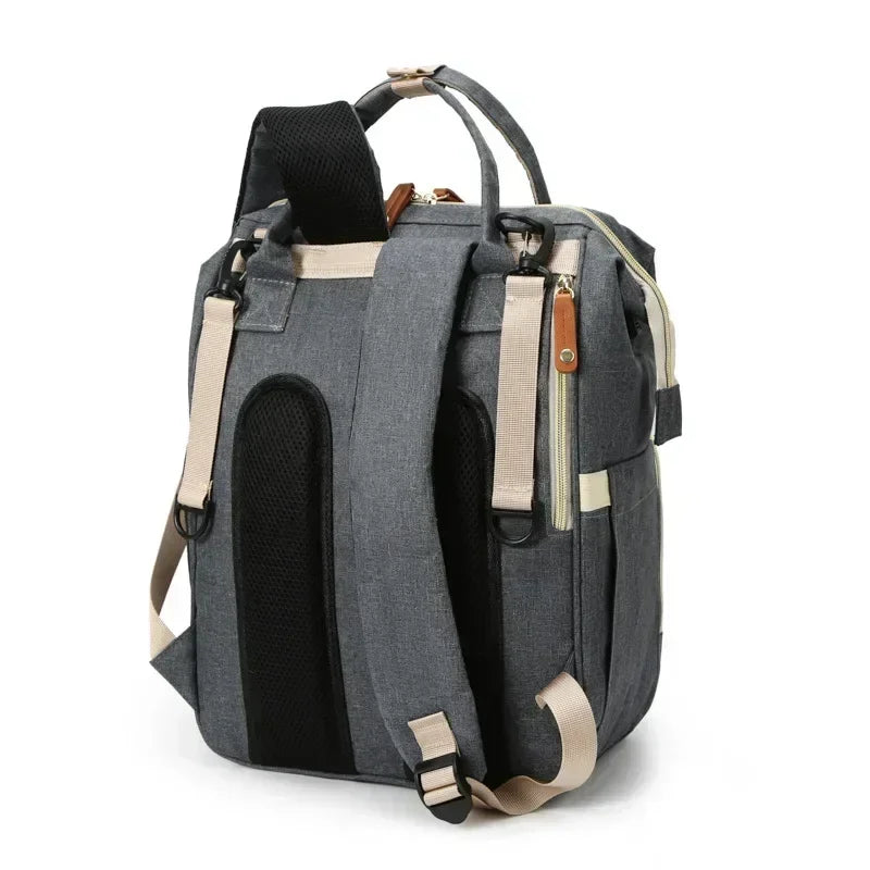 Sac à Dos à Langer pour bébé, Sac de Voyage avec Lit de Bébé Portable, 35L Grande Capacité Sac de Maternité, Sac à Couches Multifonction avec 2 Sangles de Poussette et Berceau