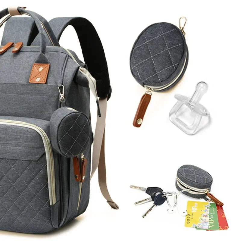 Sac à Dos à Langer pour bébé, Sac de Voyage avec Lit de Bébé Portable, 35L Grande Capacité Sac de Maternité, Sac à Couches Multifonction avec 2 Sangles de Poussette et Berceau
