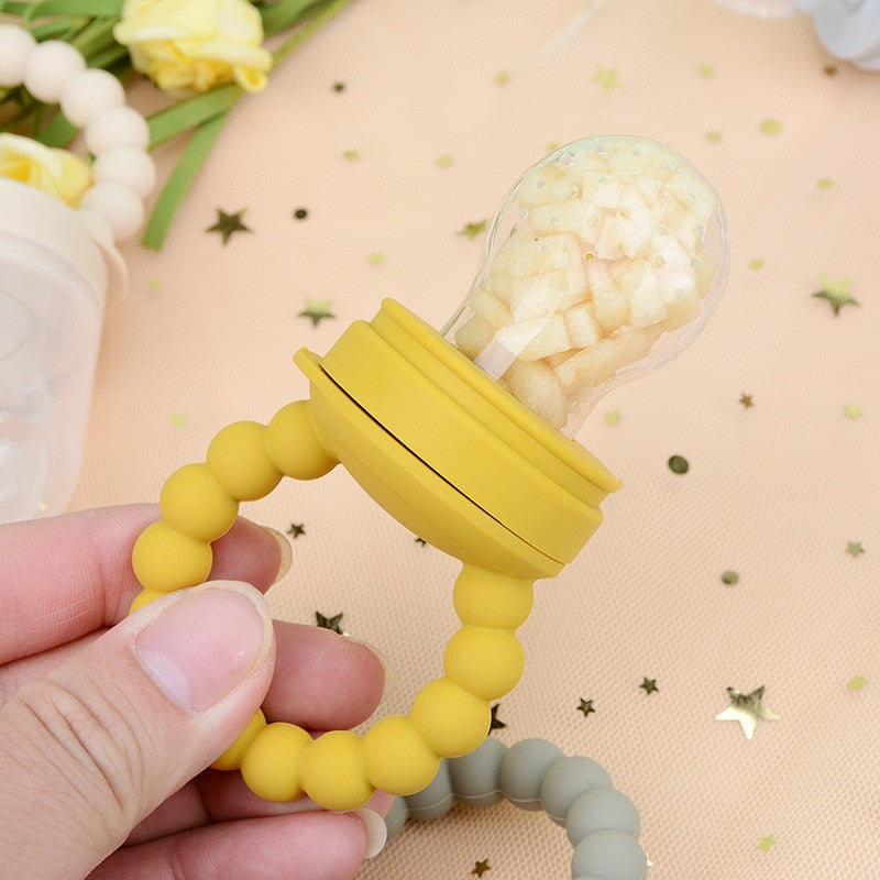 Sucette nourrisseur de fruits en Silicone pour bébé.