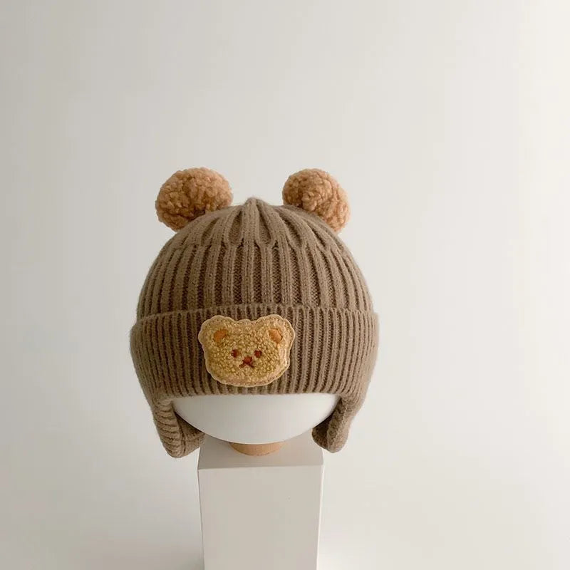 bonnet-bebe-hiver-en-maille-ourson-soldes-beige